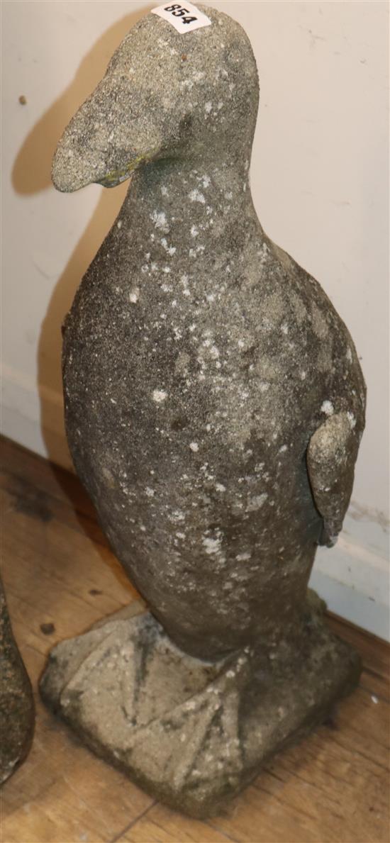A stone penguin garden ornament H.64cm